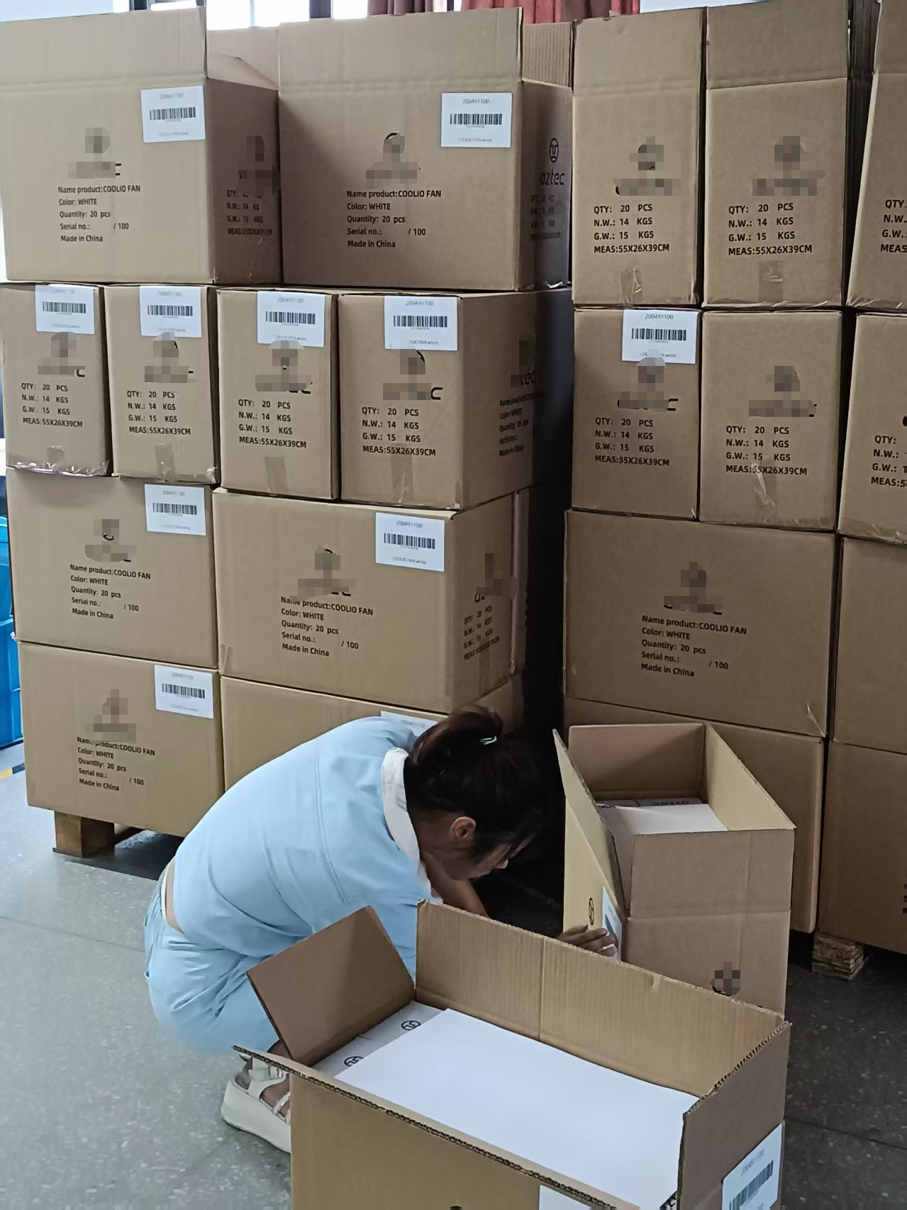camping fan light quality check at JC Cooling Essentials warehouse